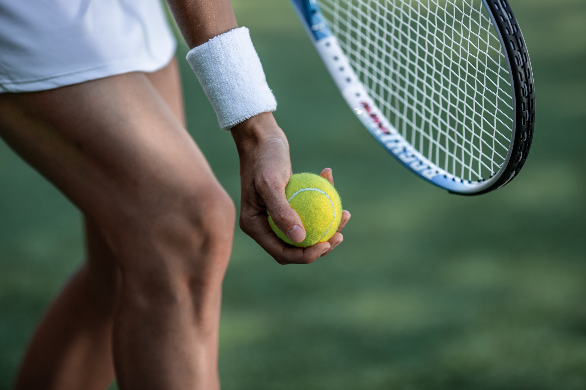 tennis-player-in-sportswear-with-a-ball.jpg